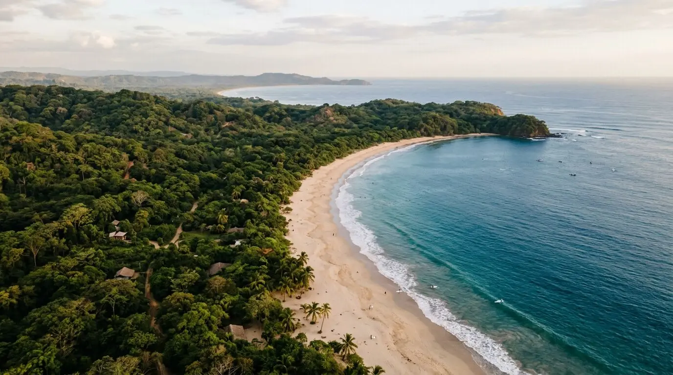 Aerial view of jungle meeting the Pacific along the Nicoya Peninsula coastline