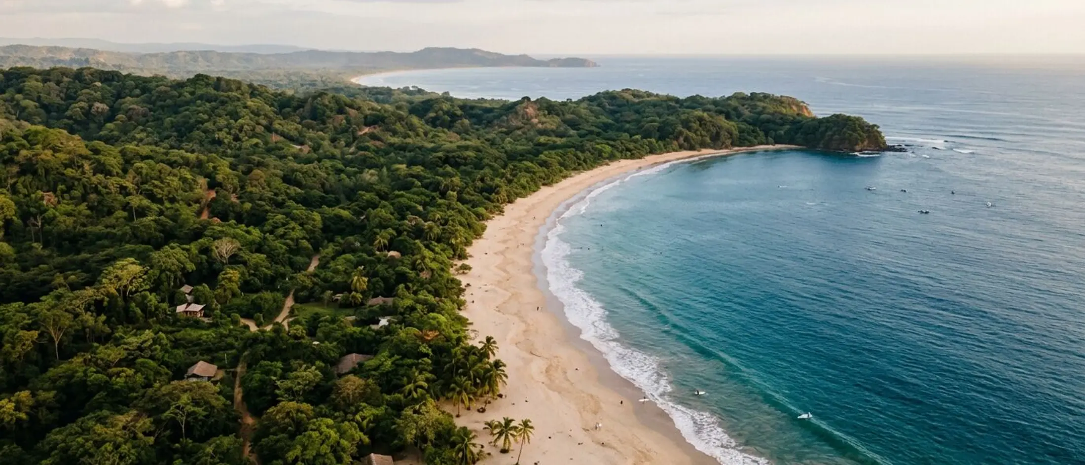 Aerial view of jungle meeting the Pacific along the Nicoya Peninsula coastline